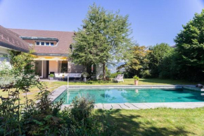 Lovely 60ies Villa on the lake, pool and Sauna